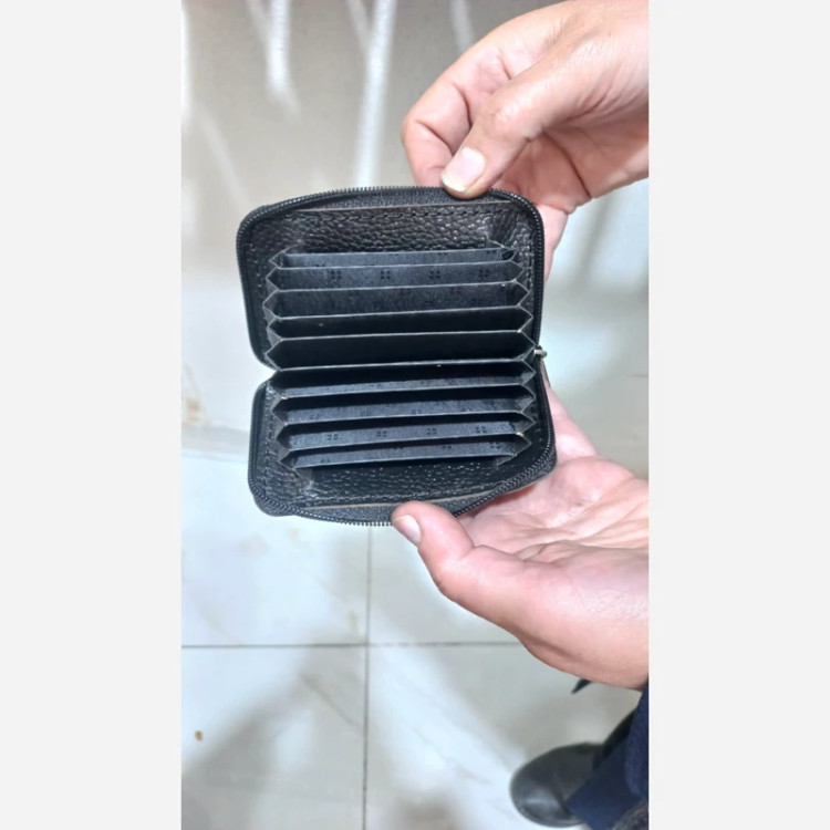 جا کارتی زیپ دار مشکی رنگ چرم طبیعی گاوی